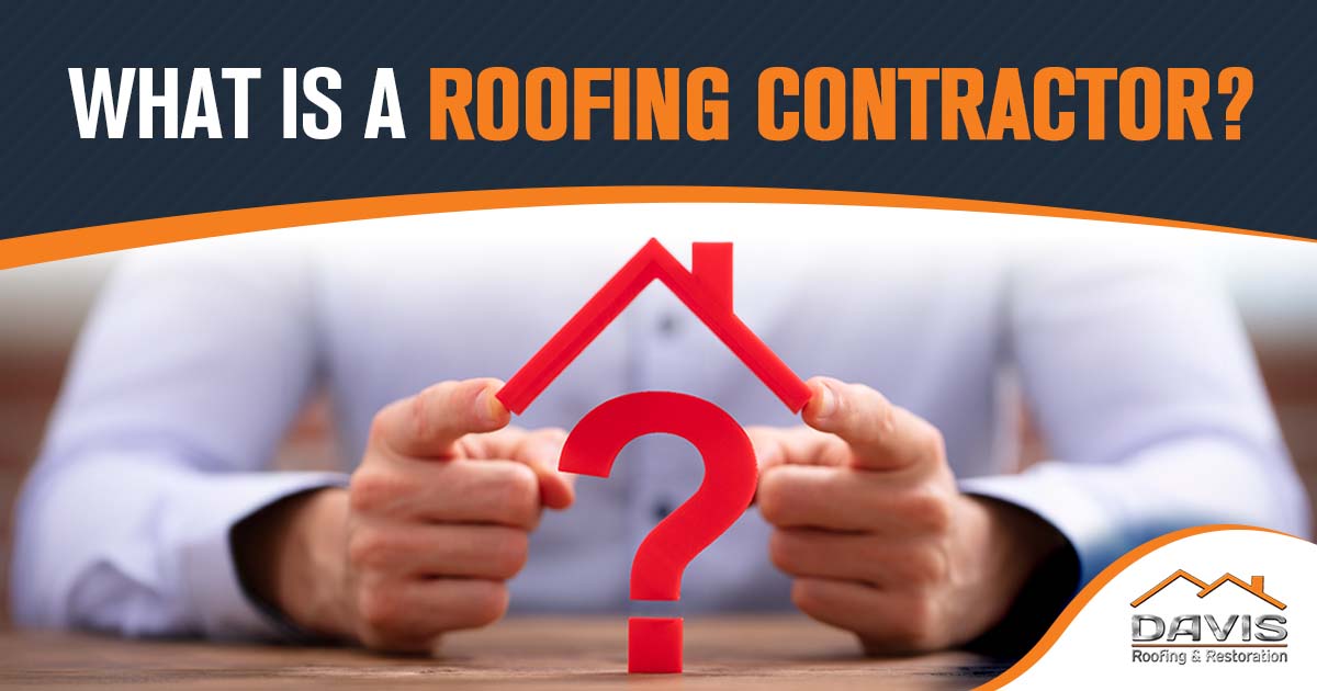 Image of a businessman's hand holding a roof over a red question mark, featuring Davis Roofing and Restoration, highlighting 'What is a roofing contractor?' and aligning with the page's context.